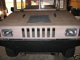 Illustration for article titled "Happy Jack" Wooden Hummer Replica A Questionable Off-Roader